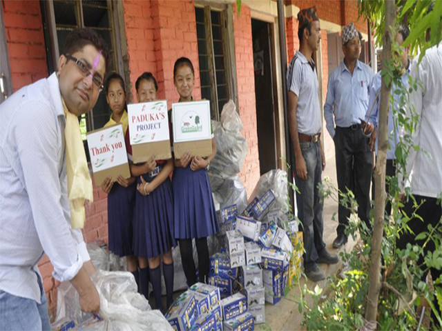 Shoes distribution among school children at   Bahundangi, Jhapa, Nepal.
